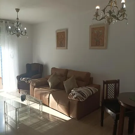 Acogedor En *